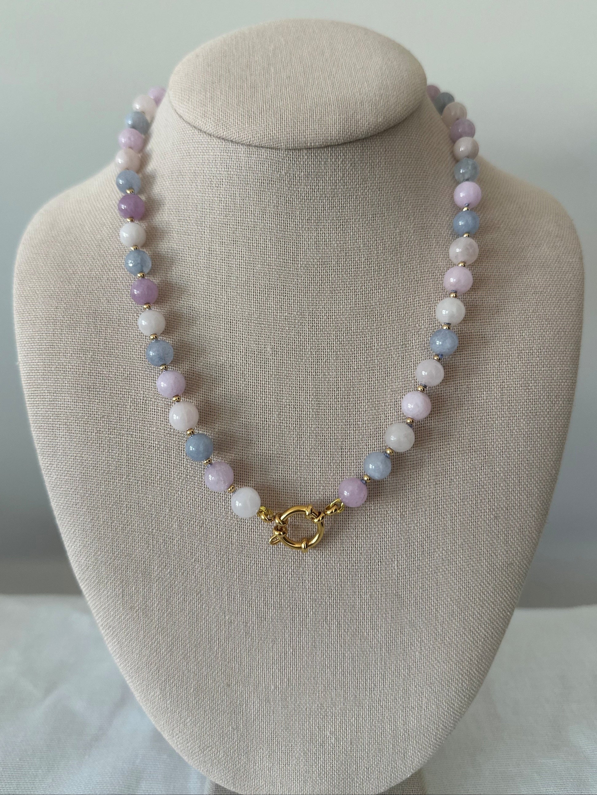 Hand-strung morganite necklace with balanced pastel hues and gold clasp